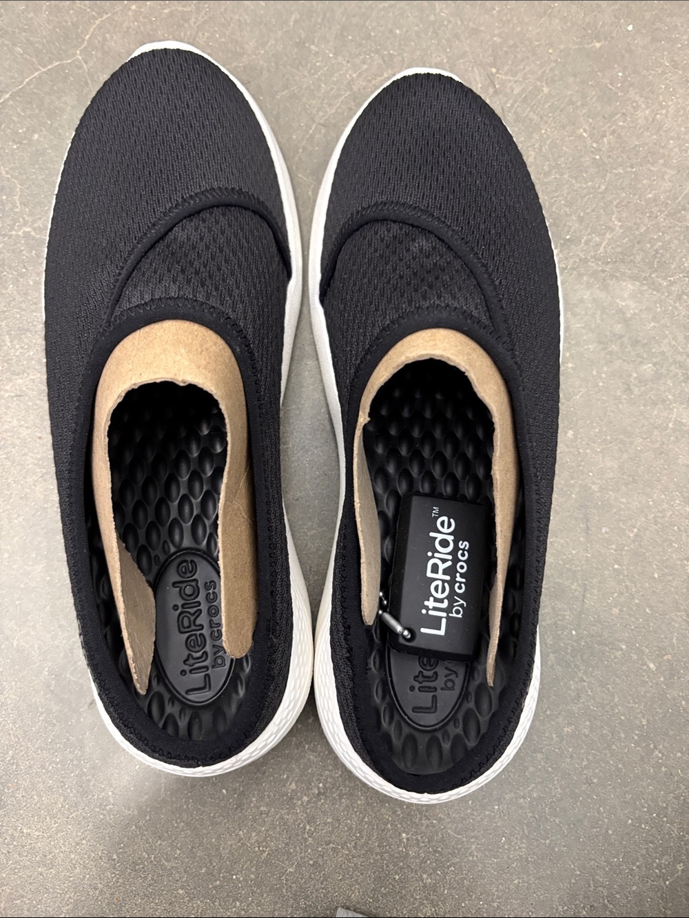 CROCS LiteRide Slip-On Sneakers in Black with White Sole